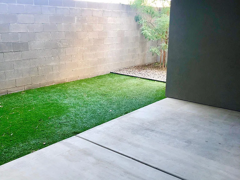 Private covered patio and backyard