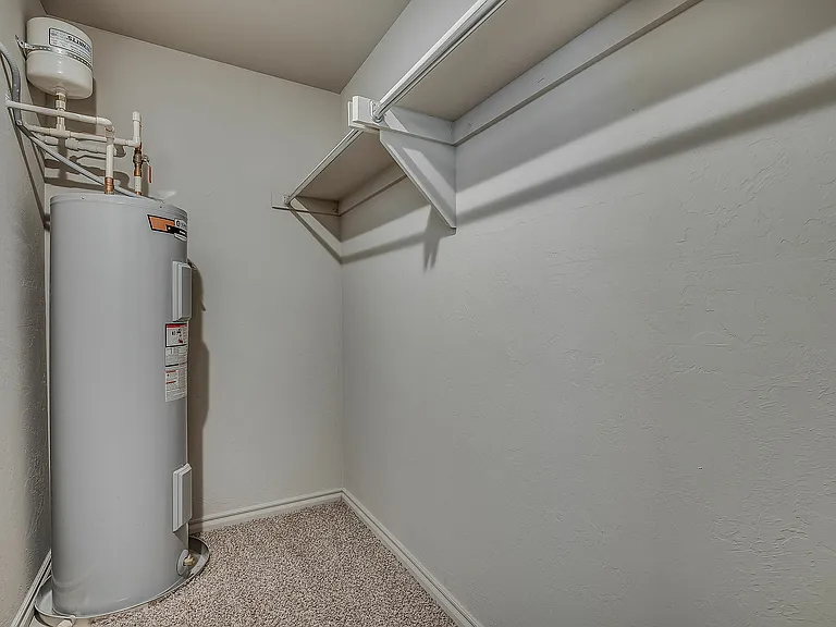 Maximize organization with this well-designed utility storage room.