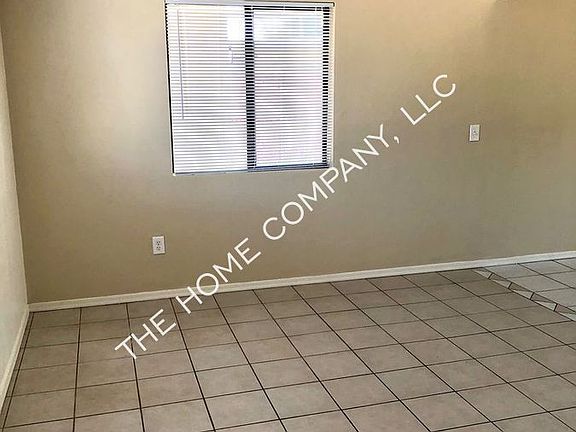 4th image of 6801 S Melody Ave