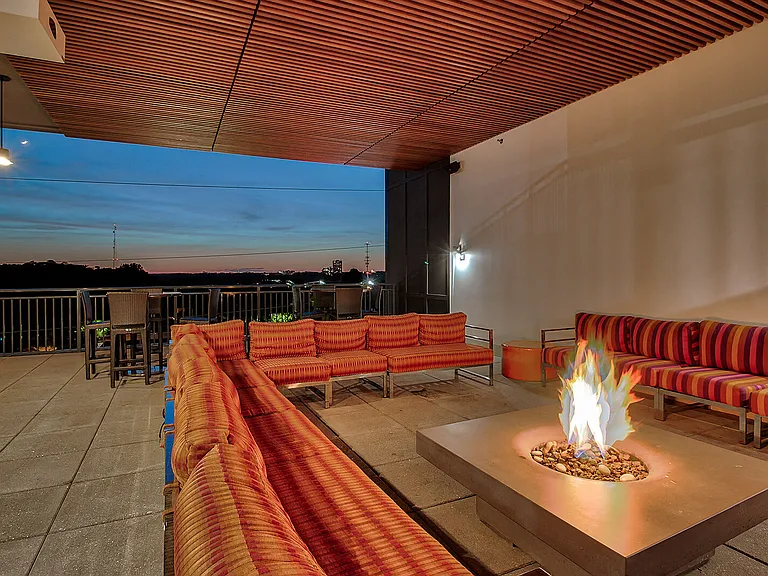 Warm up by the outdoor fire pit on cool evenings