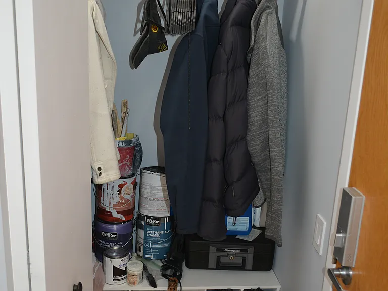 Custom front coat closet with shelf