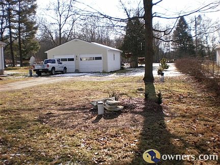 2+ car detached garage with lots of work/storage space..