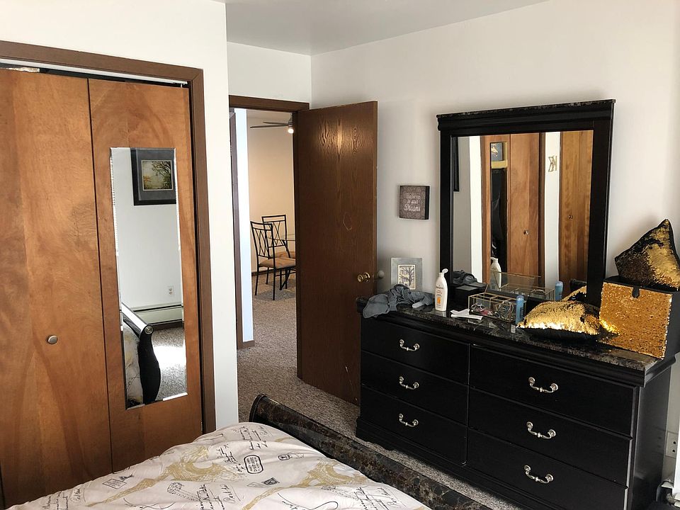 The spacious bathroom with double closets can accommodate a queen bed