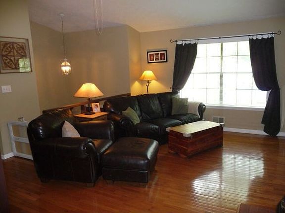living room with wood burning stove
