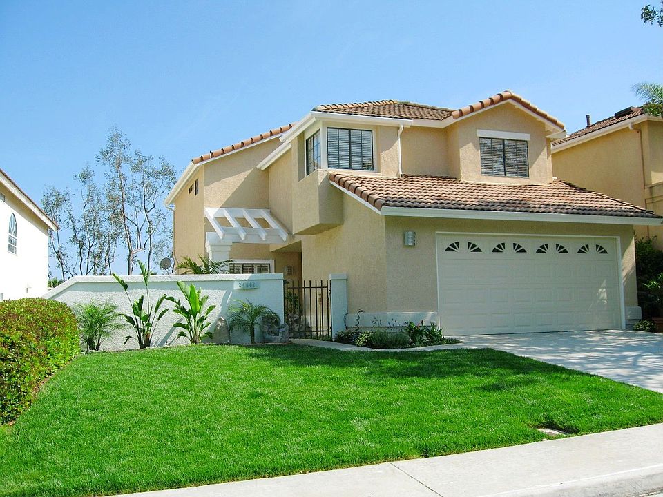 New Garage, Paint, Grass, and Resort-Style Landscaping