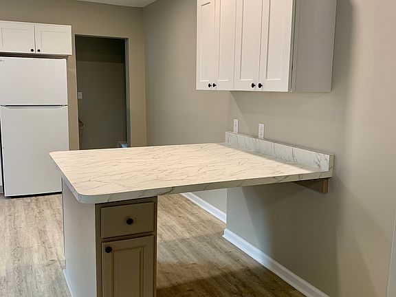 Additional cabinet space and eating area