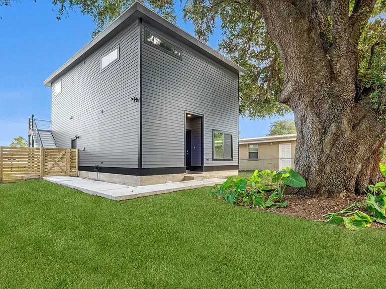 Gated backyard with 200+ year old oak tree. (Backyard grass is simulated)