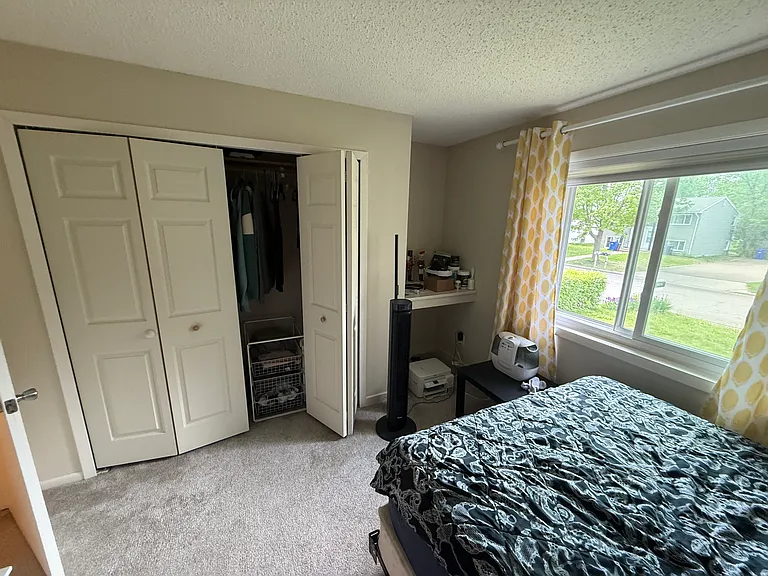 LEFt Upstairs bedroom (current tenant set up)