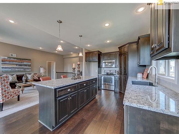 Whirlpool stainless steel microwave, dishwasher and range for move-in-ready convenience
