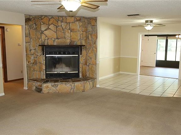 Living Room with Wood Burning Fireplace