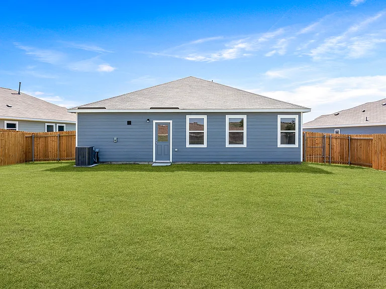 The back yard of the Reed is fully fenced-in.