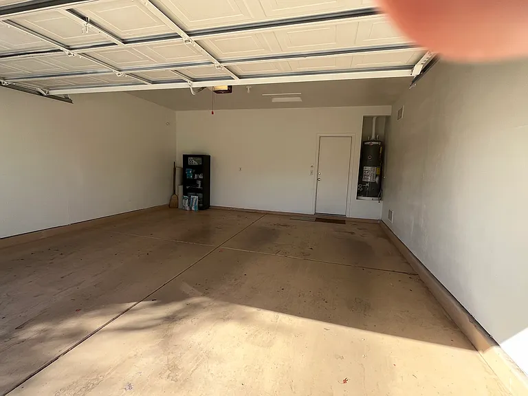 2 Car Garage (plus 3rd car parking space & EV charging outlet)