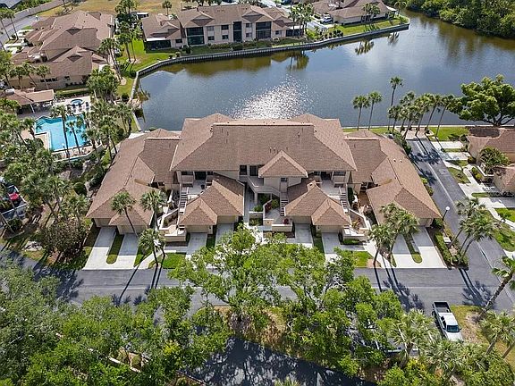 view of pool/lake/development