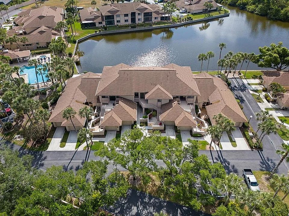 view of pool/lake/development