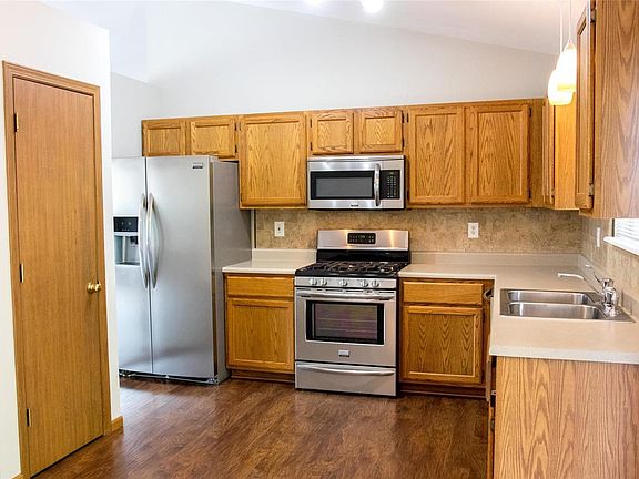Kitchen offers nice stainless steel appliances, updated countertop and pantry