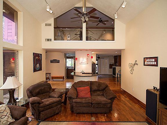A view inside the home, hardwood floors in the living and dining room space