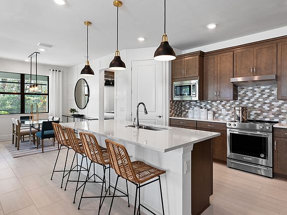 Model Representation Kitchen with center island and stainless steel appliances