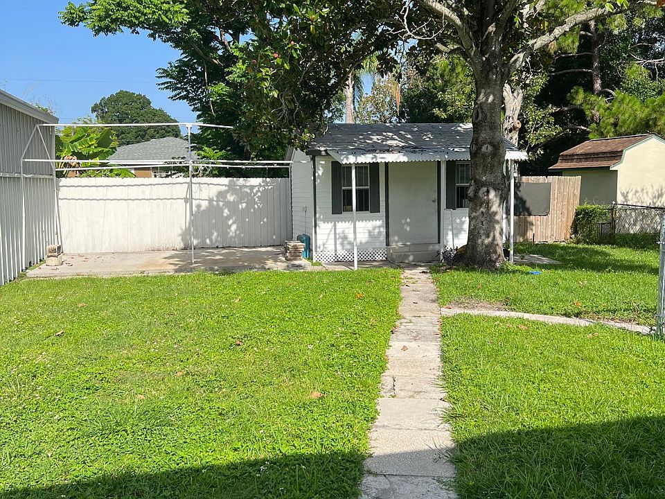 Laundry shed and outdoor kitchen area with electric and water