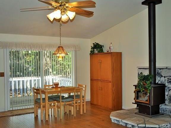 Looking into the dining area and out onto the back deck through