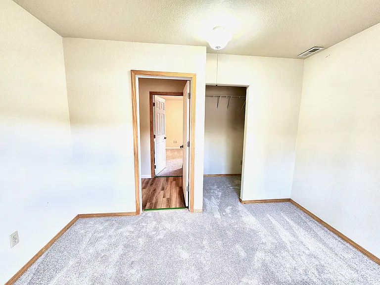 The fourth bedroom lower a walk-in closet