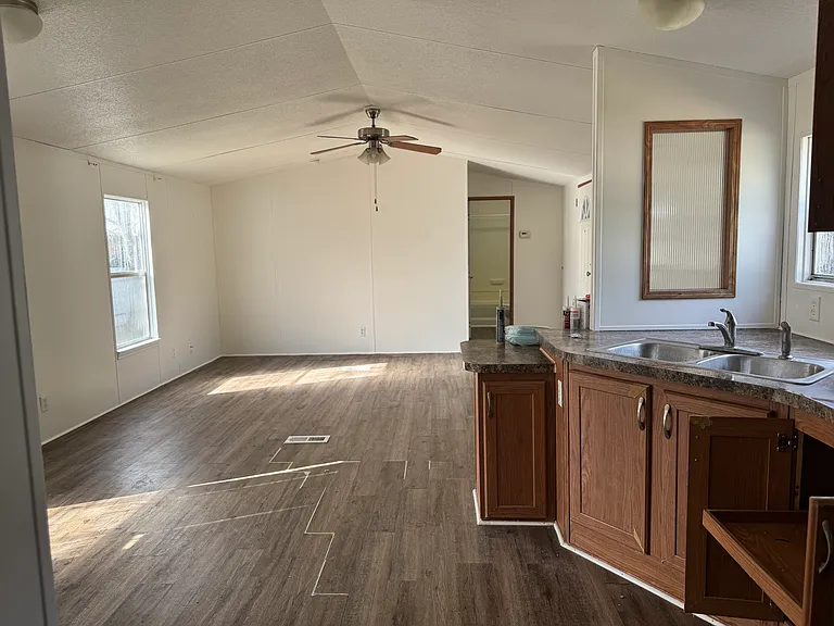 Part of the kitchen. Luxury vinyl plak throughout.