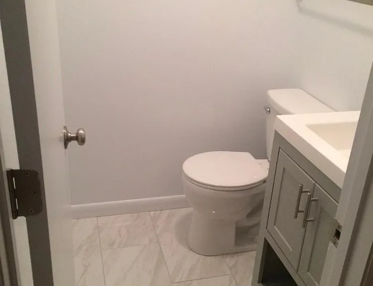 Recently renovated half-bath a few steps away from the kitchen