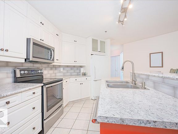 3rd image of 12028 103rd Ave NW #108