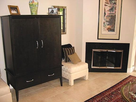 Living room with fireplace (gas included).