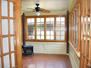 sun room with gas stove