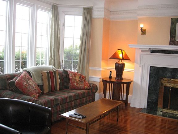 Living Room with Curved Ceilings and Fireplace