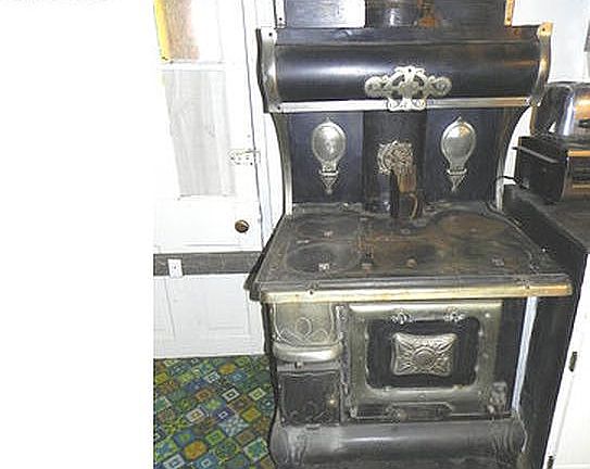 Antique stove protected wall