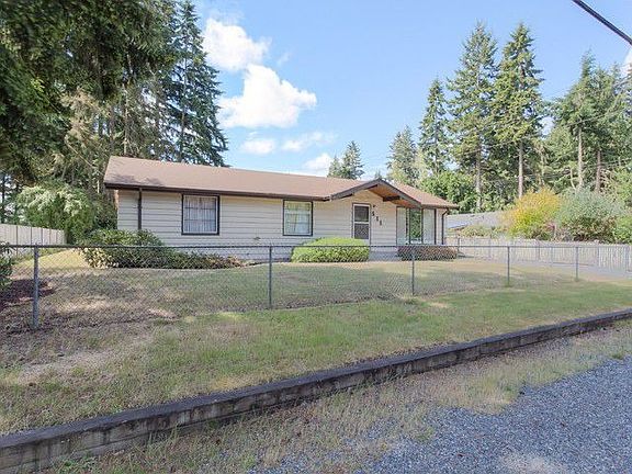 Huge, level, partially fenced lot ~ 1/4 acre features mature rhododendrons and azaleas. Enjoy the privacy!
