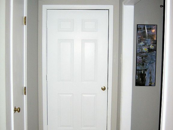 Entry with cased opening leading to the spacious living area