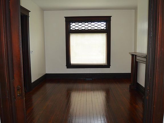 living room with pocket doors facing the street