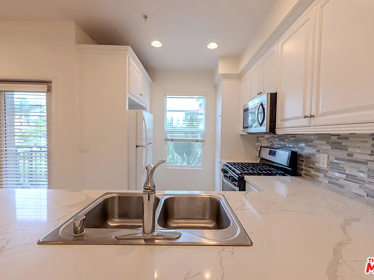 6020 Seabluff Dr #302 — Photo 14