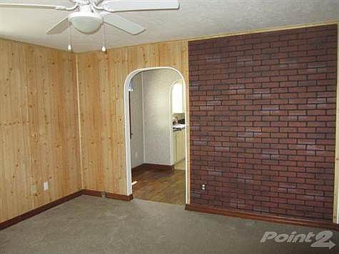 Living Room looking towards the dining area and Kitchen