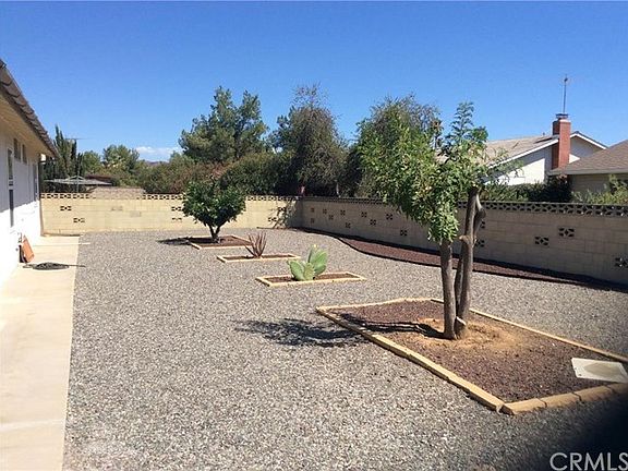Clean and easy upkeep backyard.