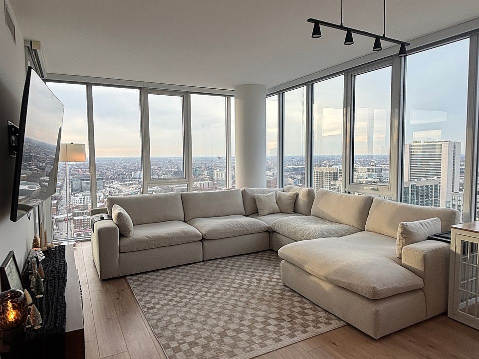 Large living area with northwestern exposure provides abundant natural light.