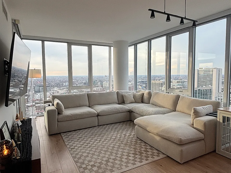 Large living area with northwestern exposure provides abundant natural light.