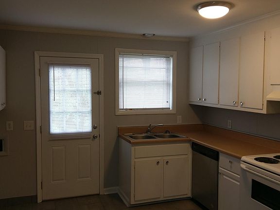 w/d hookups in kitchen. Tons of cabinets