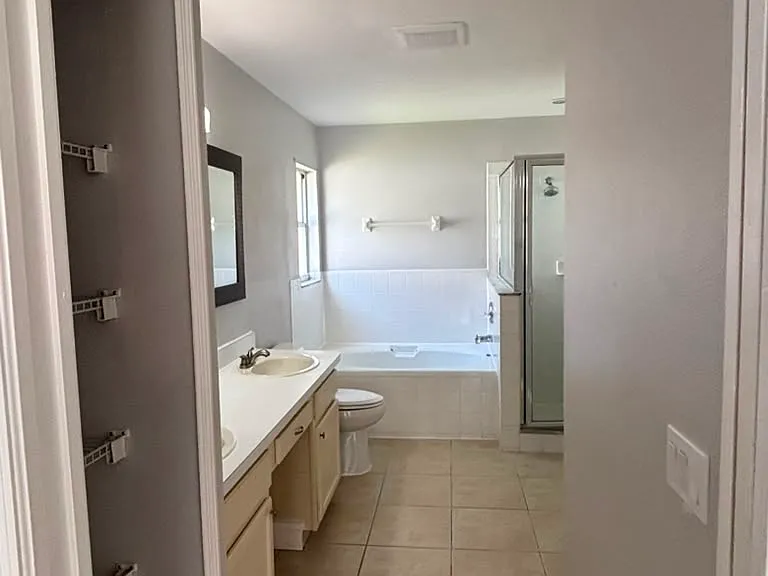Primary bathroom, with large tub and walk-in shower!