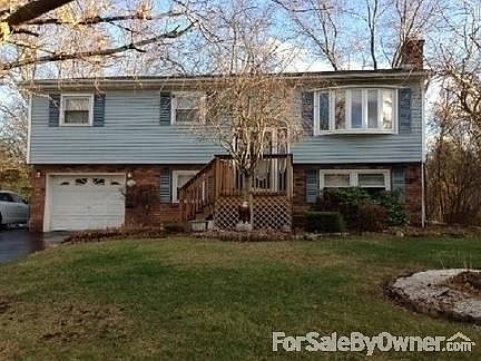 Front : Brick, vinyl siding , Gutters, Ex large dr.