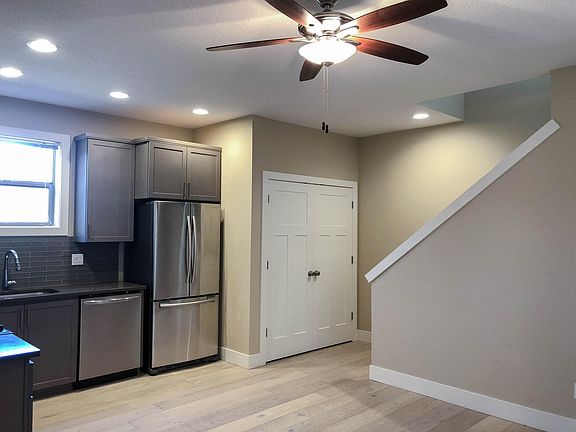 Laundry closet and staircase to third floor.