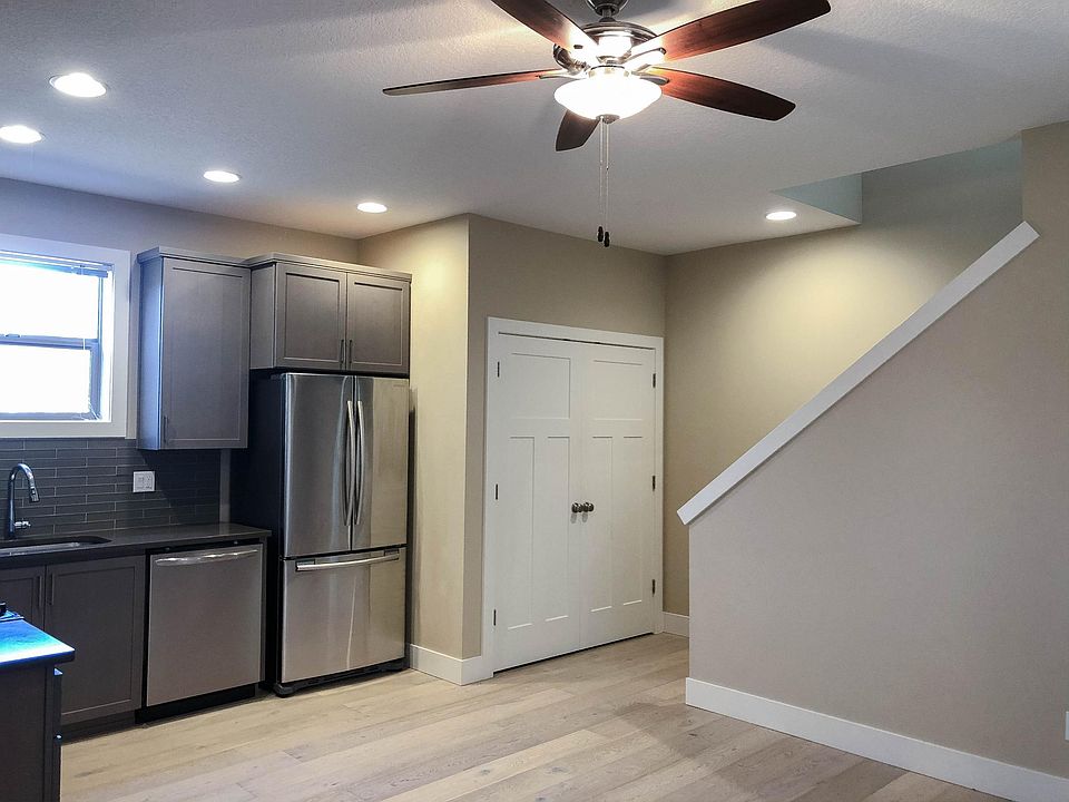 Laundry closet and staircase to third floor.