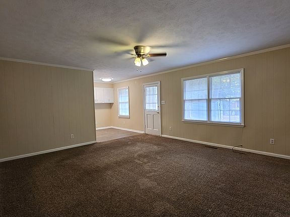 den with a door to the back yard