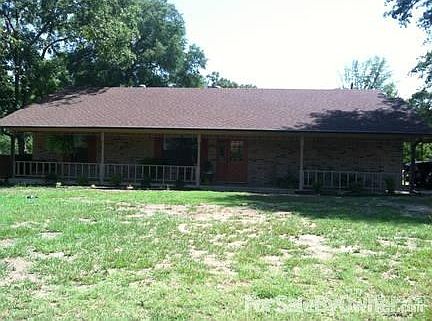Ranch Style Home : Long nice front porch with new landscaping