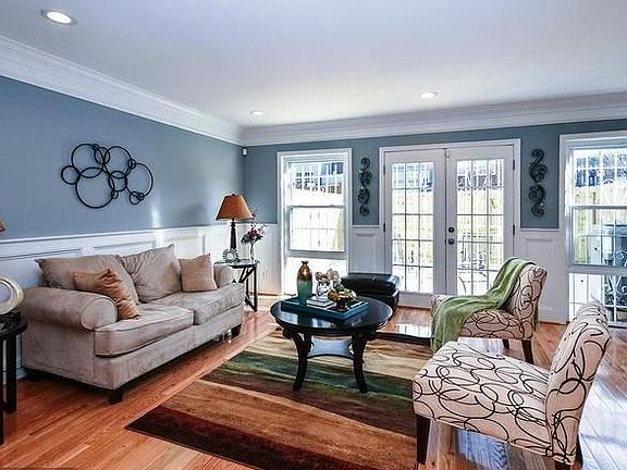 PLEASE NOTE, The decor in the living room photos is not mine - these pictures were taken by a realtor (staging). My furniture style is more Mid-Century Modern + Artsy + Anthropologie. I'm available to give you a facetime tour.