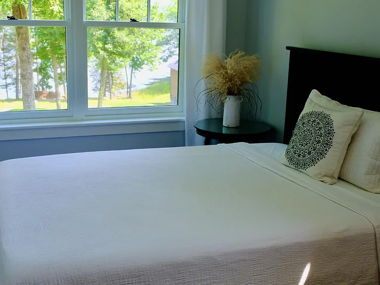 Alternate photo of bedroom with view of Little Bay