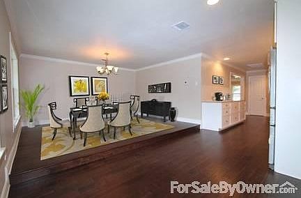 Dining Room
						:
						Entertain in style in the elegant split-level dining room.