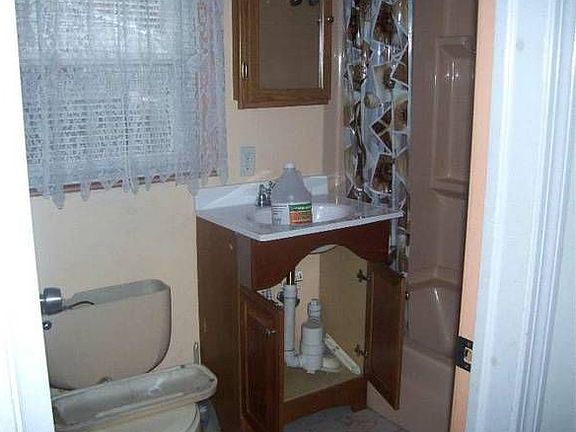 Full bathroom with tub